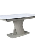 Table à manger extensible en métal beige plateau céramique blanc 180-240 cm DUBAI
