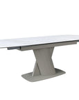 Table à manger extensible en métal beige plateau céramique blanc 180-240 cm DUBAI
