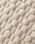 Coussin beige en tissu texturé doux 45x45 cm DUNE
