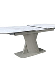 Table à manger extensible en métal beige plateau céramique blanc 180-240 cm DUBAI